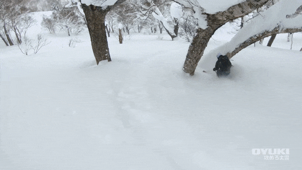 Adam Kroenert and Pep Fujas sharing a powder run in the Hokkaido Backcountry