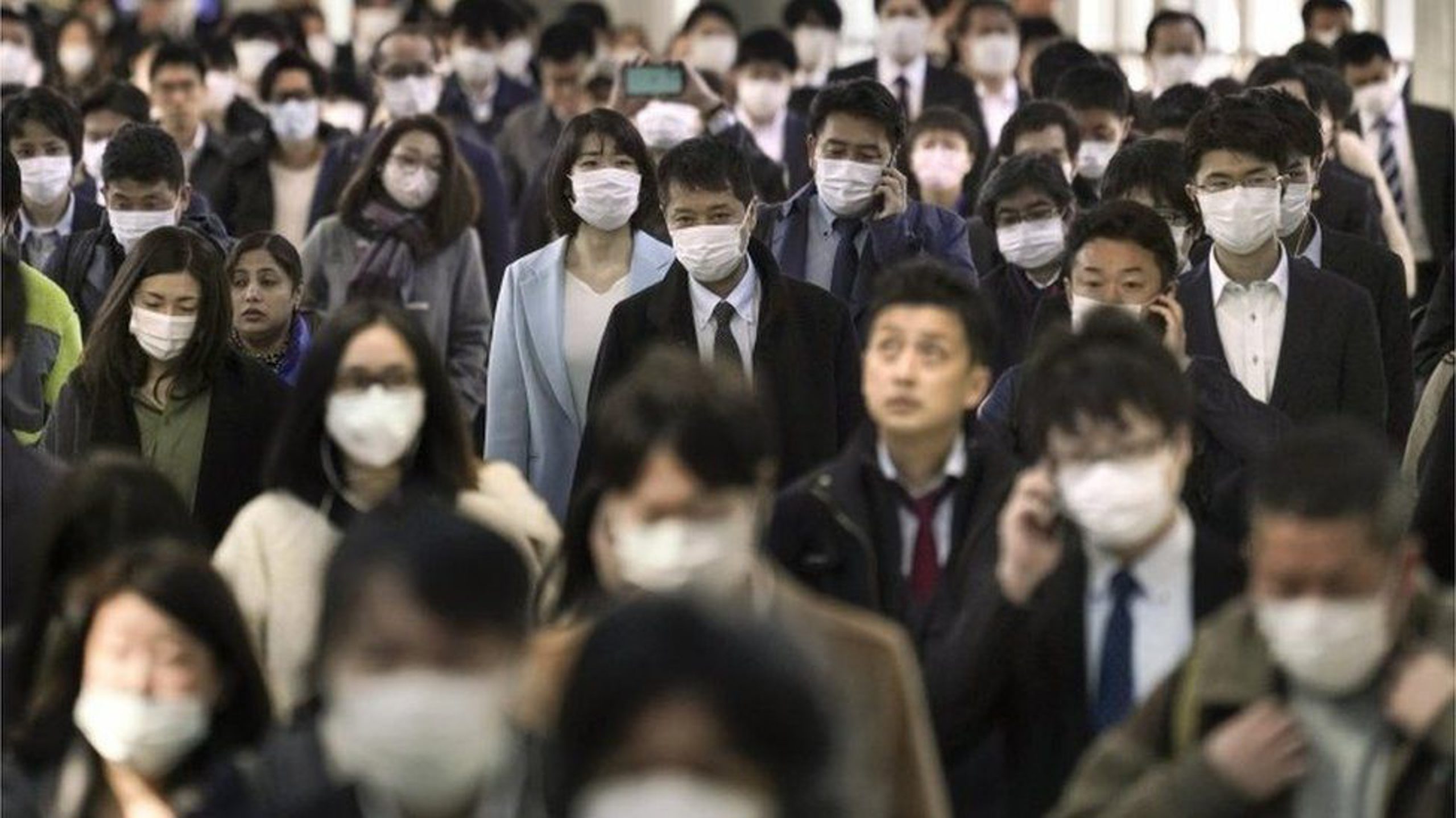 Residents of Japan masking up against the COVID-19 pandemic